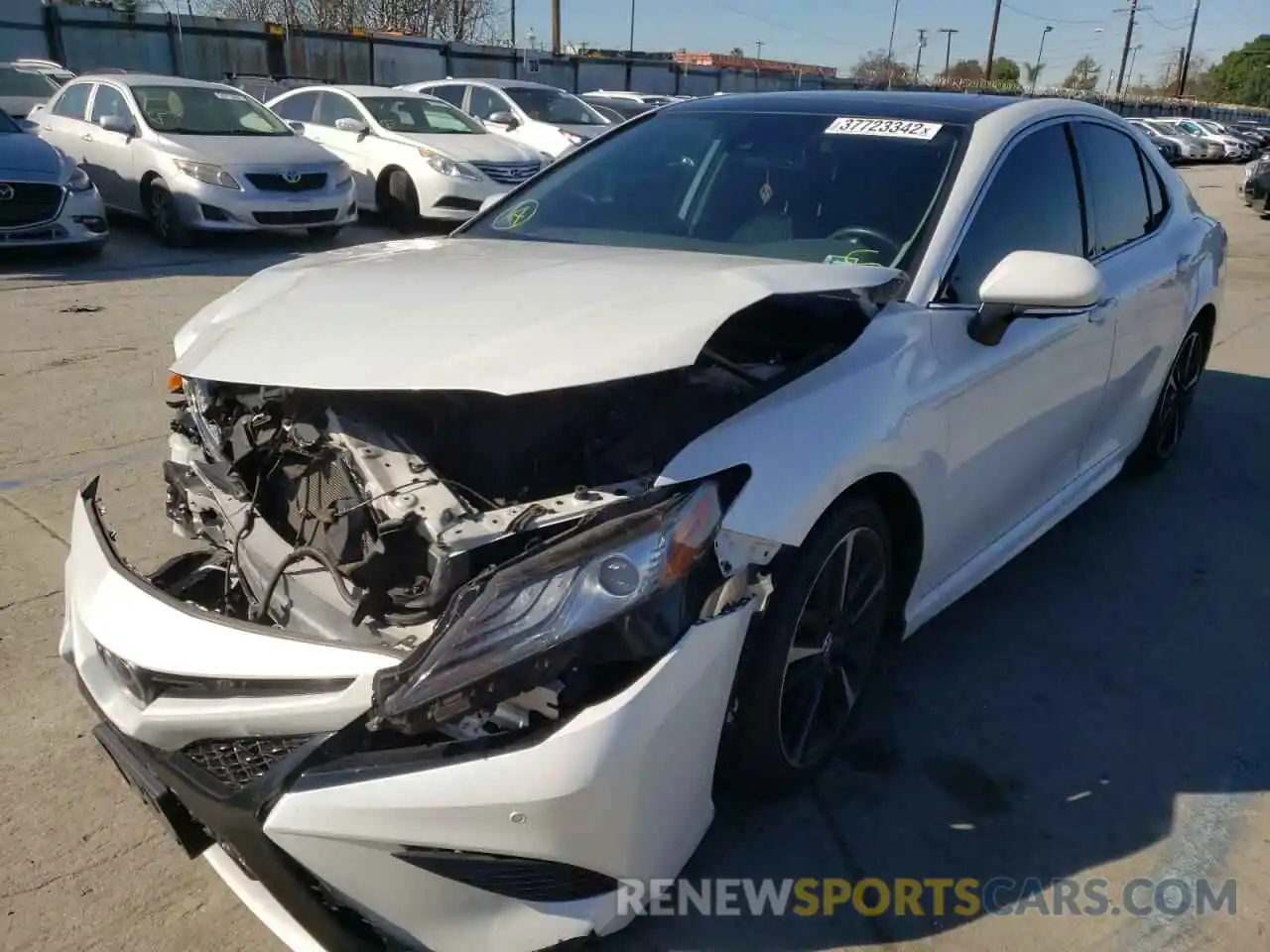 2 Photograph of a damaged car 4T1BZ1HK2KU030537 TOYOTA CAMRY 2019