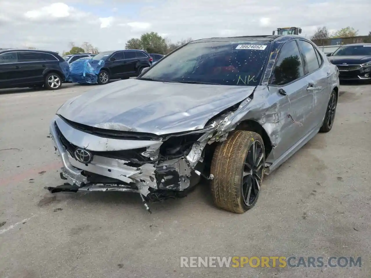 2 Photograph of a damaged car 4T1BZ1HK2KU030912 TOYOTA CAMRY 2019