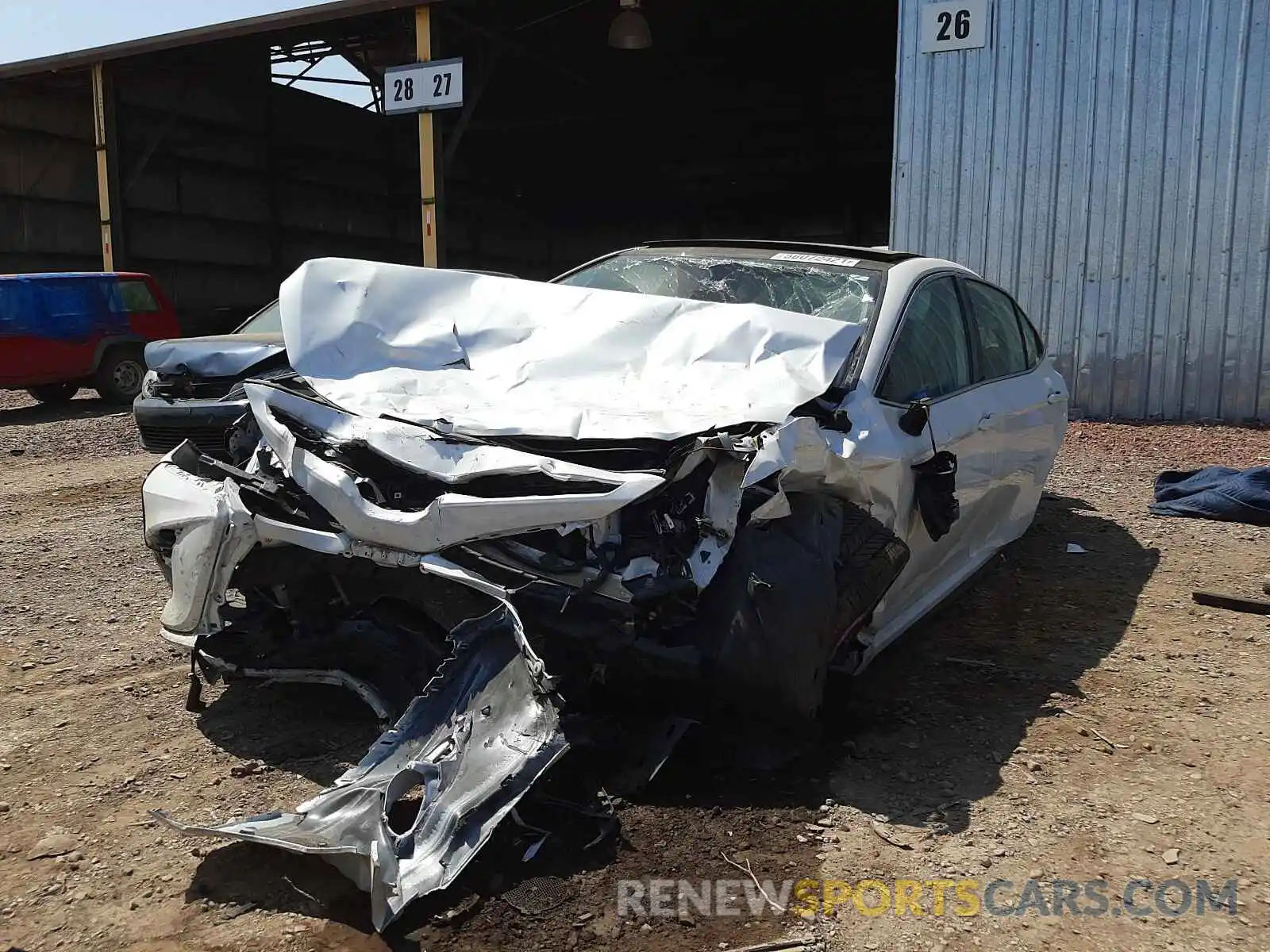 2 Photograph of a damaged car 4T1BZ1HK2KU031963 TOYOTA CAMRY 2019