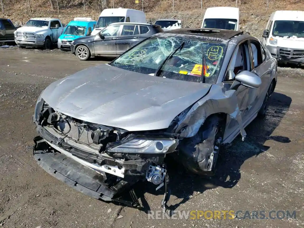 2 Photograph of a damaged car 4T1BZ1HK2KU032868 TOYOTA CAMRY 2019