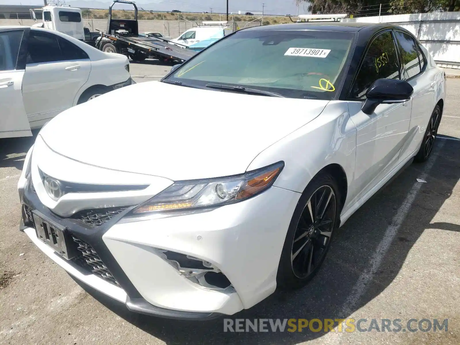 2 Photograph of a damaged car 4T1BZ1HK3KU023810 TOYOTA CAMRY 2019