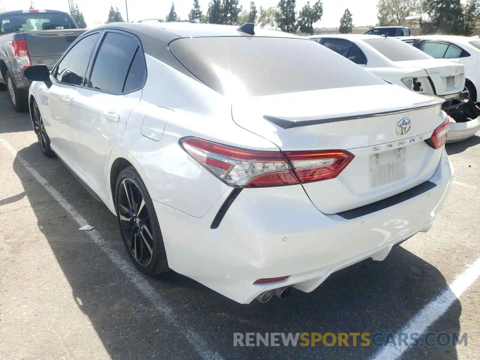 3 Photograph of a damaged car 4T1BZ1HK3KU023810 TOYOTA CAMRY 2019