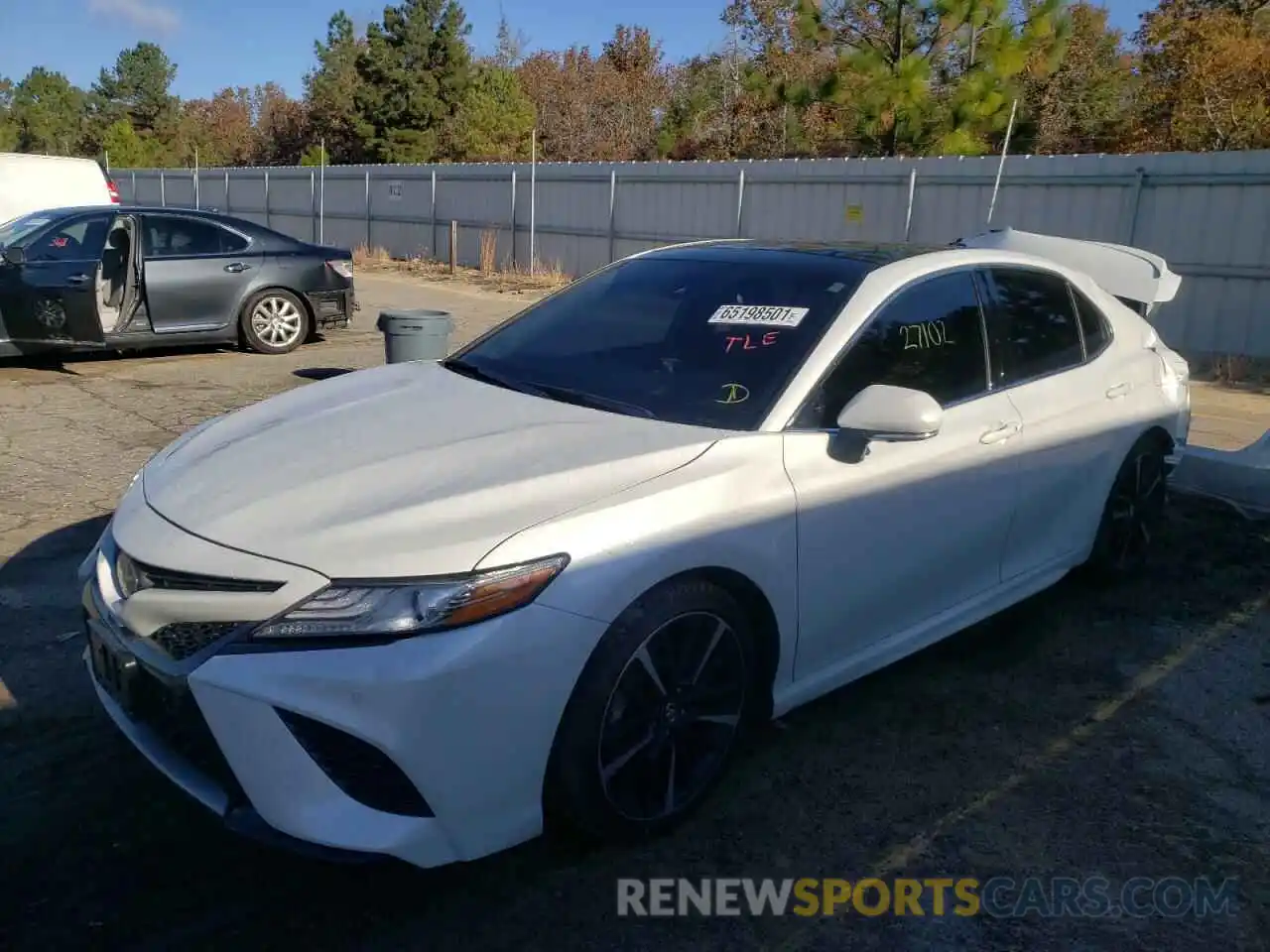 2 Photograph of a damaged car 4T1BZ1HK3KU028523 TOYOTA CAMRY 2019