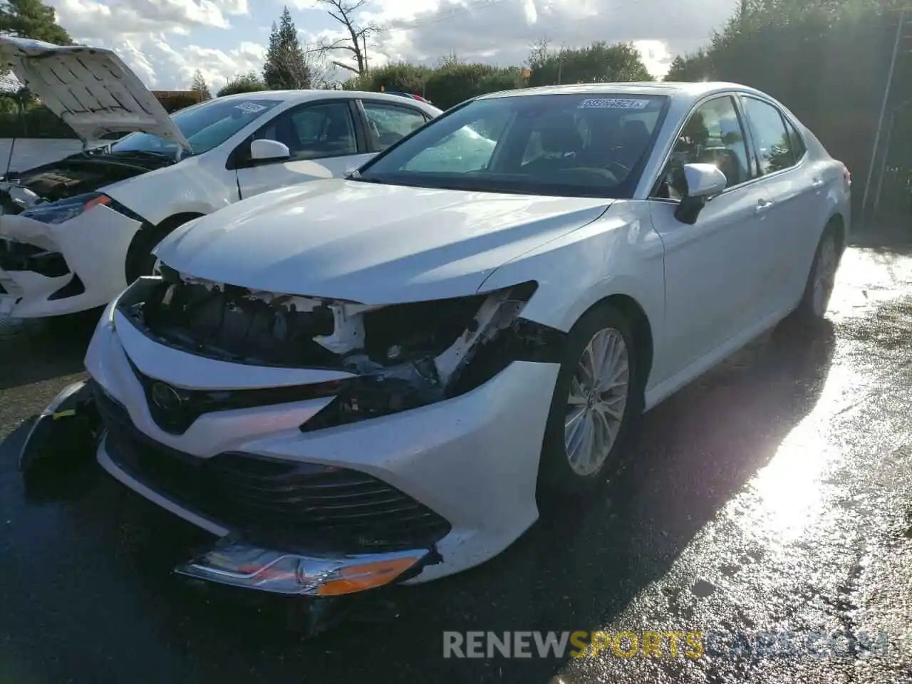 2 Photograph of a damaged car 4T1BZ1HK3KU028943 TOYOTA CAMRY 2019