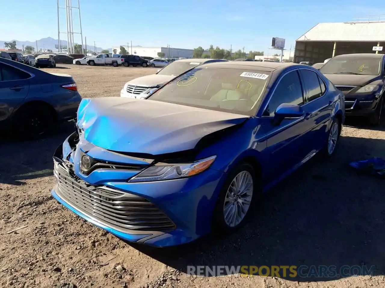 2 Photograph of a damaged car 4T1BZ1HK4KU024240 TOYOTA CAMRY 2019