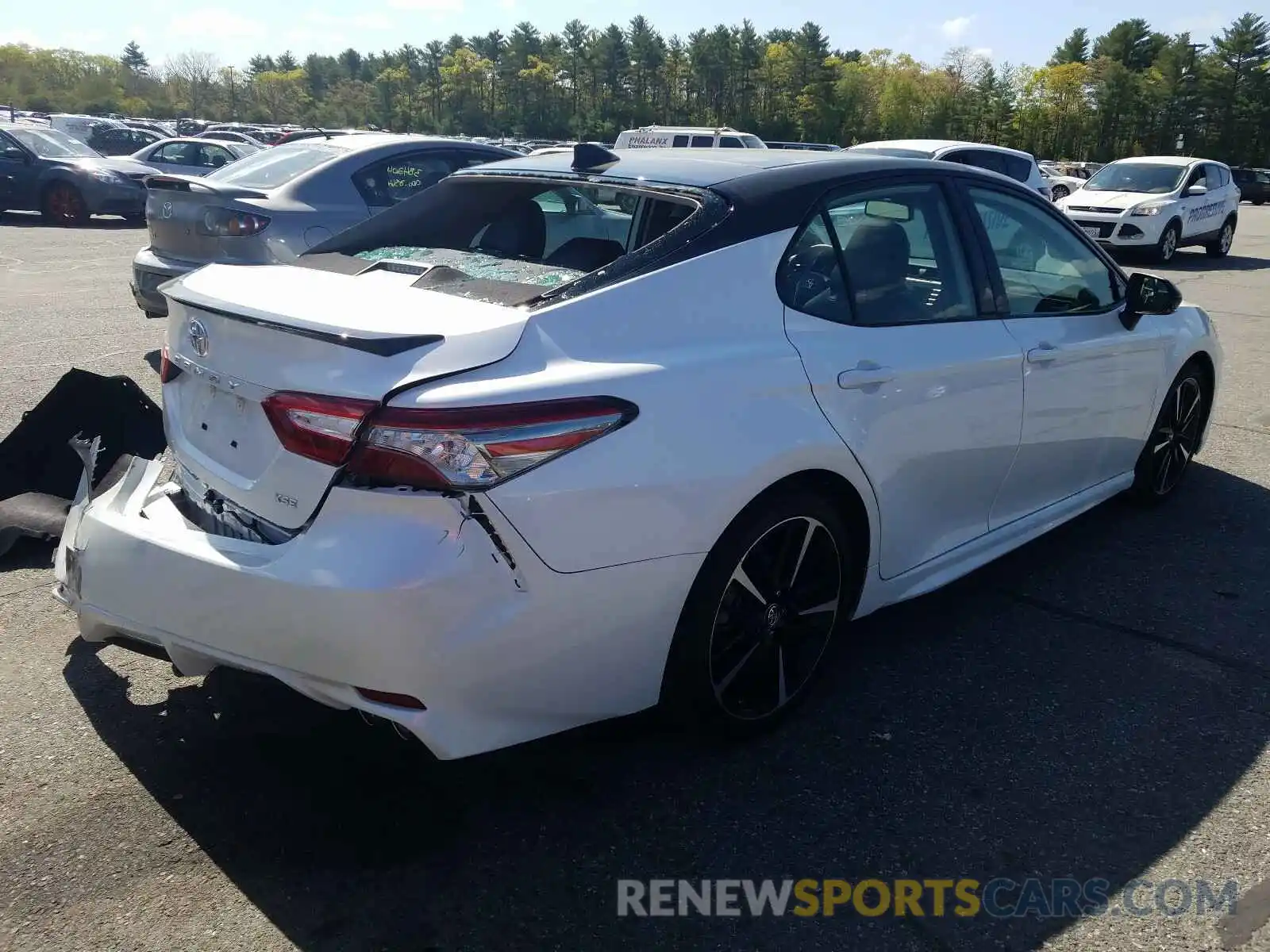 4 Photograph of a damaged car 4T1BZ1HK4KU024951 TOYOTA CAMRY 2019