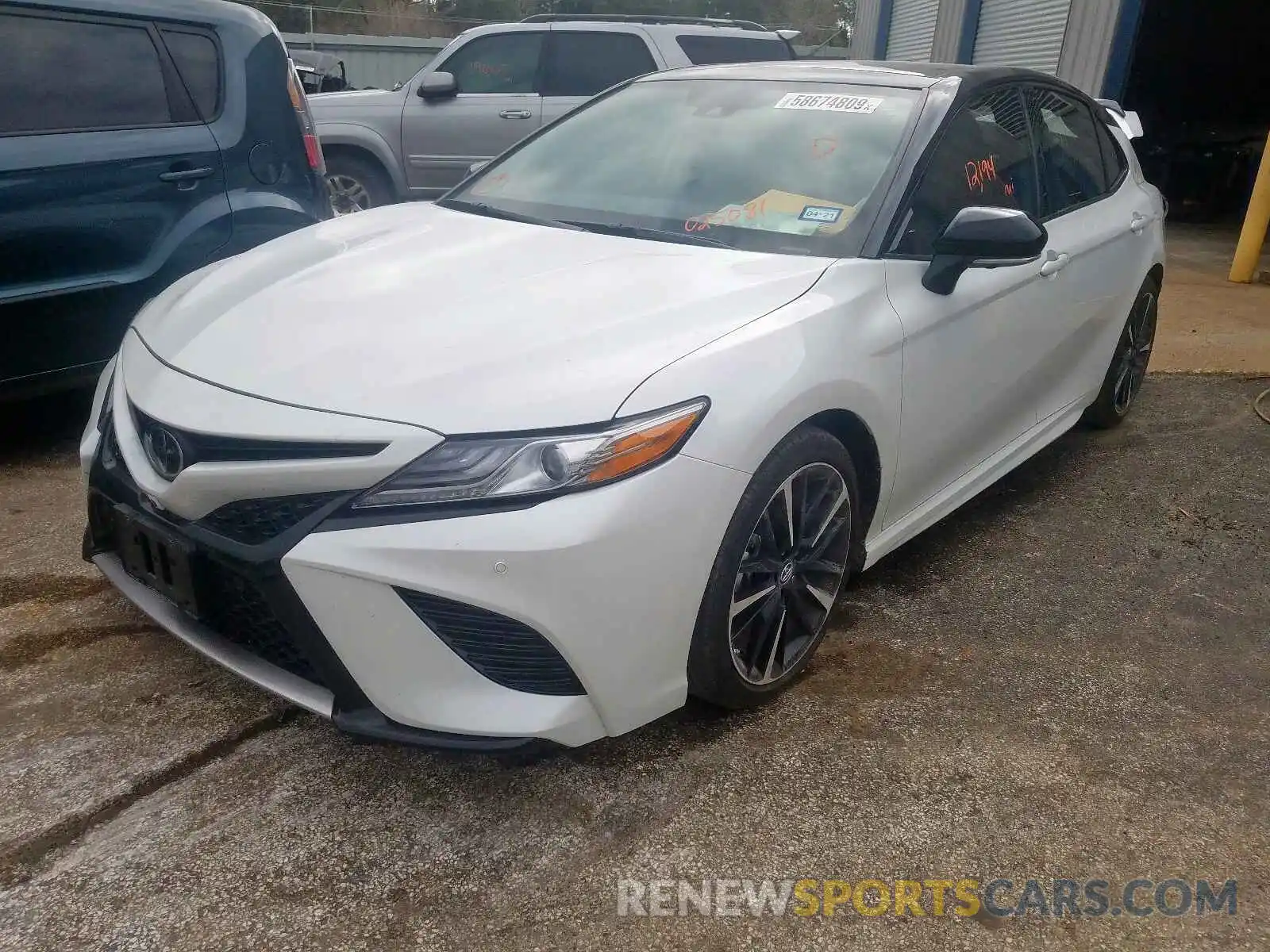 2 Photograph of a damaged car 4T1BZ1HK4KU025081 TOYOTA CAMRY 2019