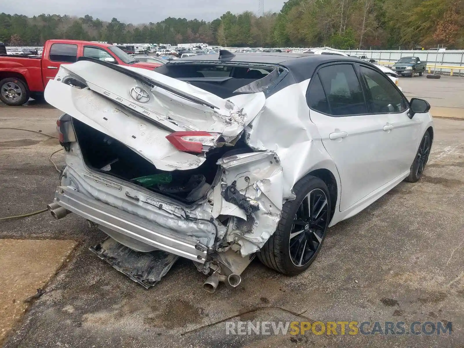 4 Photograph of a damaged car 4T1BZ1HK4KU025081 TOYOTA CAMRY 2019