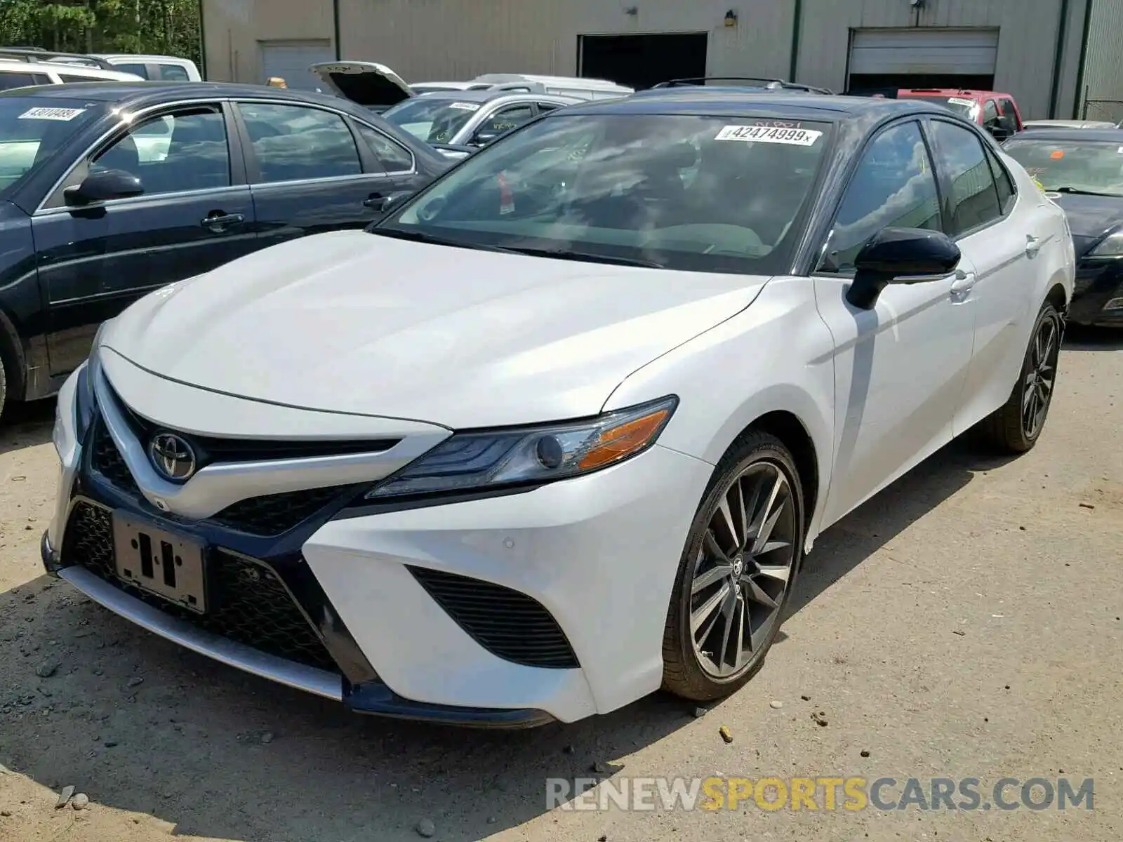 2 Photograph of a damaged car 4T1BZ1HK5KU025204 TOYOTA CAMRY 2019