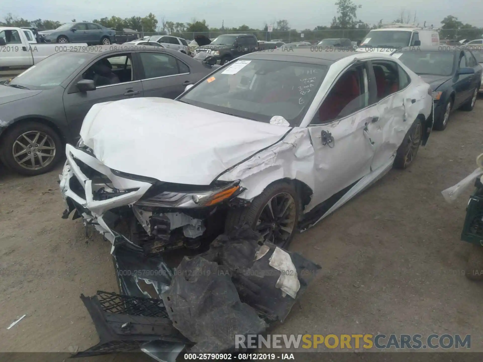 2 Photograph of a damaged car 4T1BZ1HK5KU507686 TOYOTA CAMRY 2019