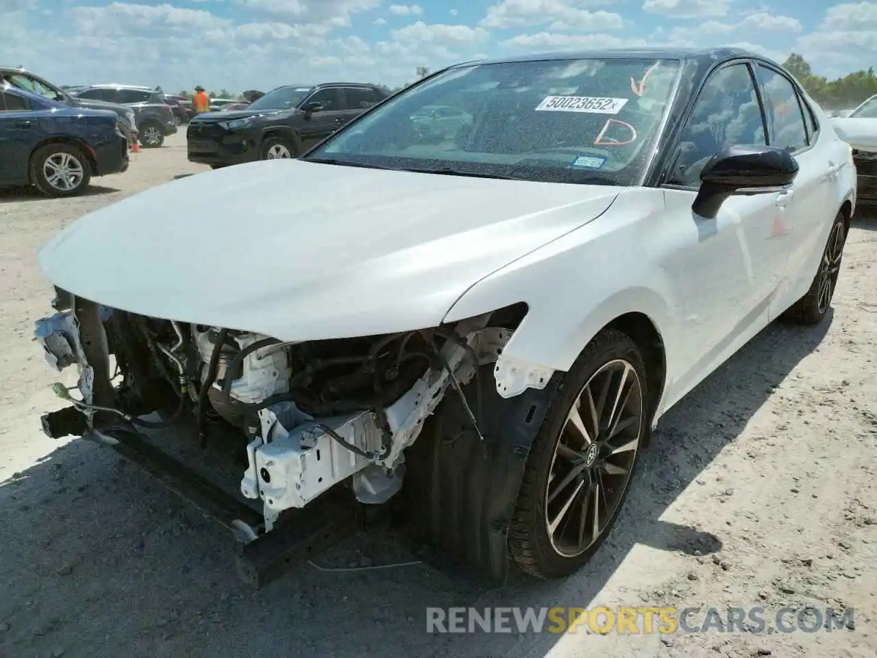 2 Photograph of a damaged car 4T1BZ1HK6KU024546 TOYOTA CAMRY 2019