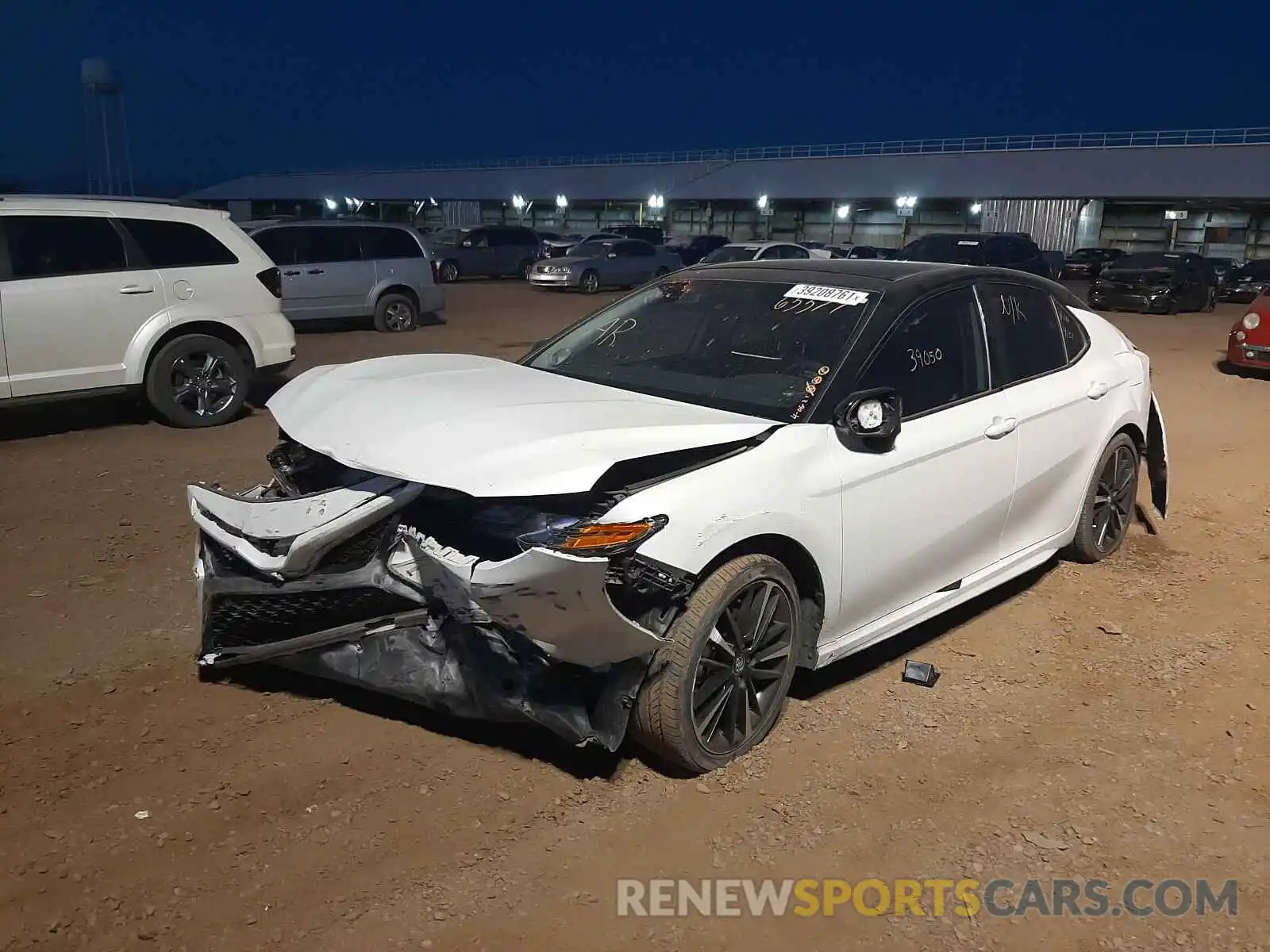 2 Photograph of a damaged car 4T1BZ1HK6KU025874 TOYOTA CAMRY 2019