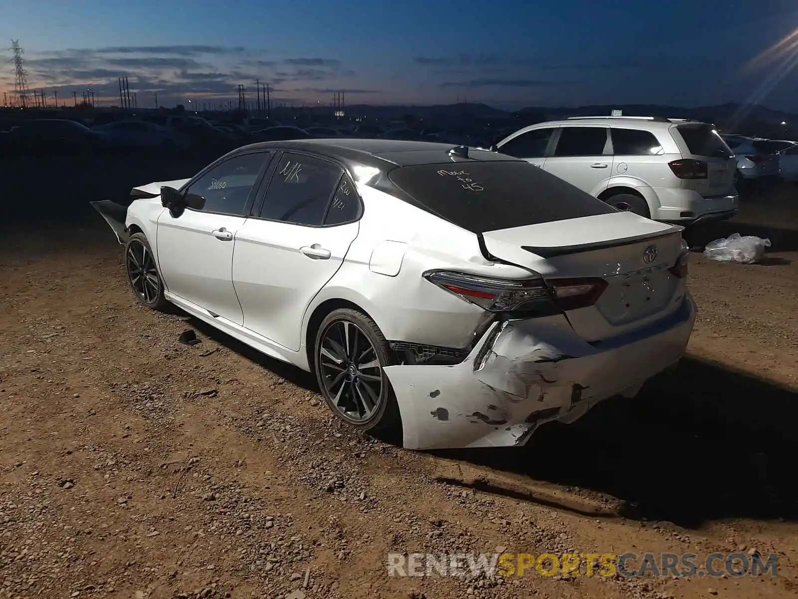 3 Photograph of a damaged car 4T1BZ1HK6KU025874 TOYOTA CAMRY 2019