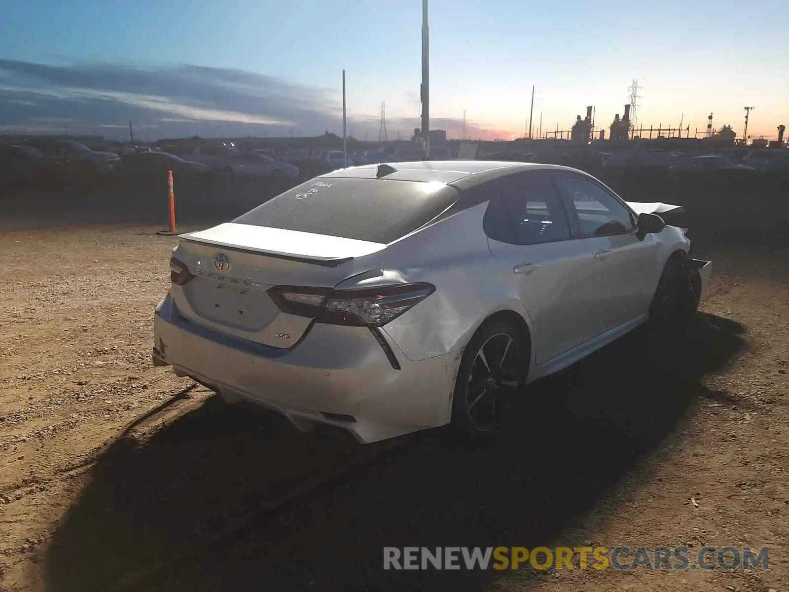 4 Photograph of a damaged car 4T1BZ1HK6KU025874 TOYOTA CAMRY 2019