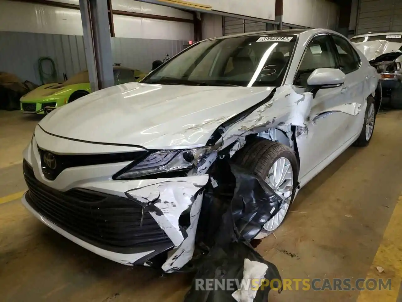 2 Photograph of a damaged car 4T1BZ1HK6KU027463 TOYOTA CAMRY 2019