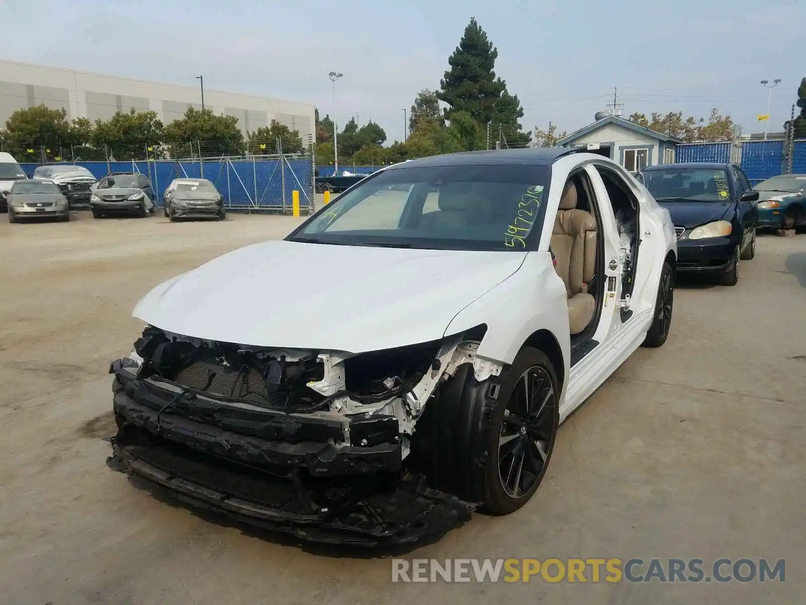 2 Photograph of a damaged car 4T1BZ1HK6KU028094 TOYOTA CAMRY 2019