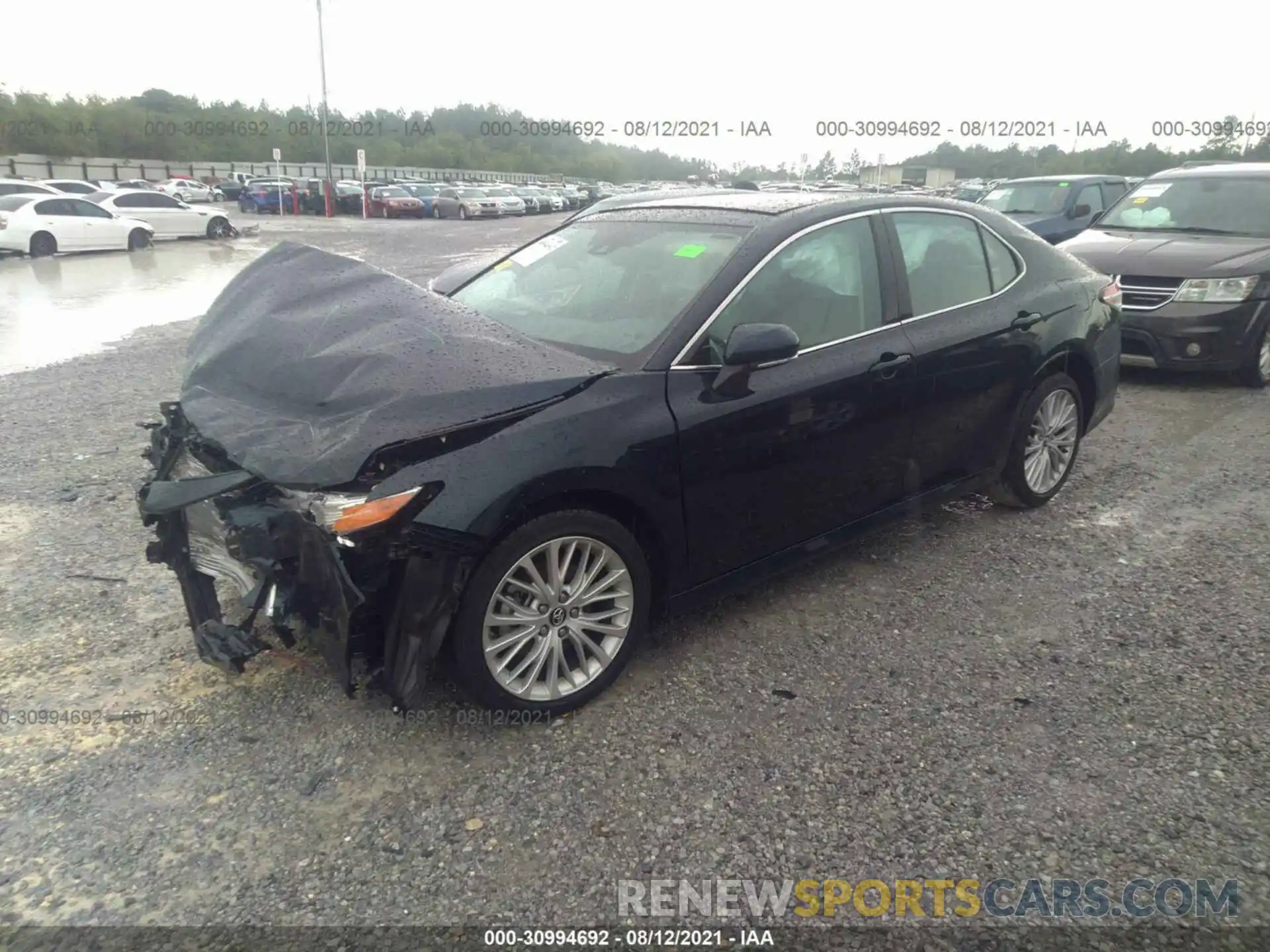 2 Photograph of a damaged car 4T1BZ1HK6KU030640 TOYOTA CAMRY 2019