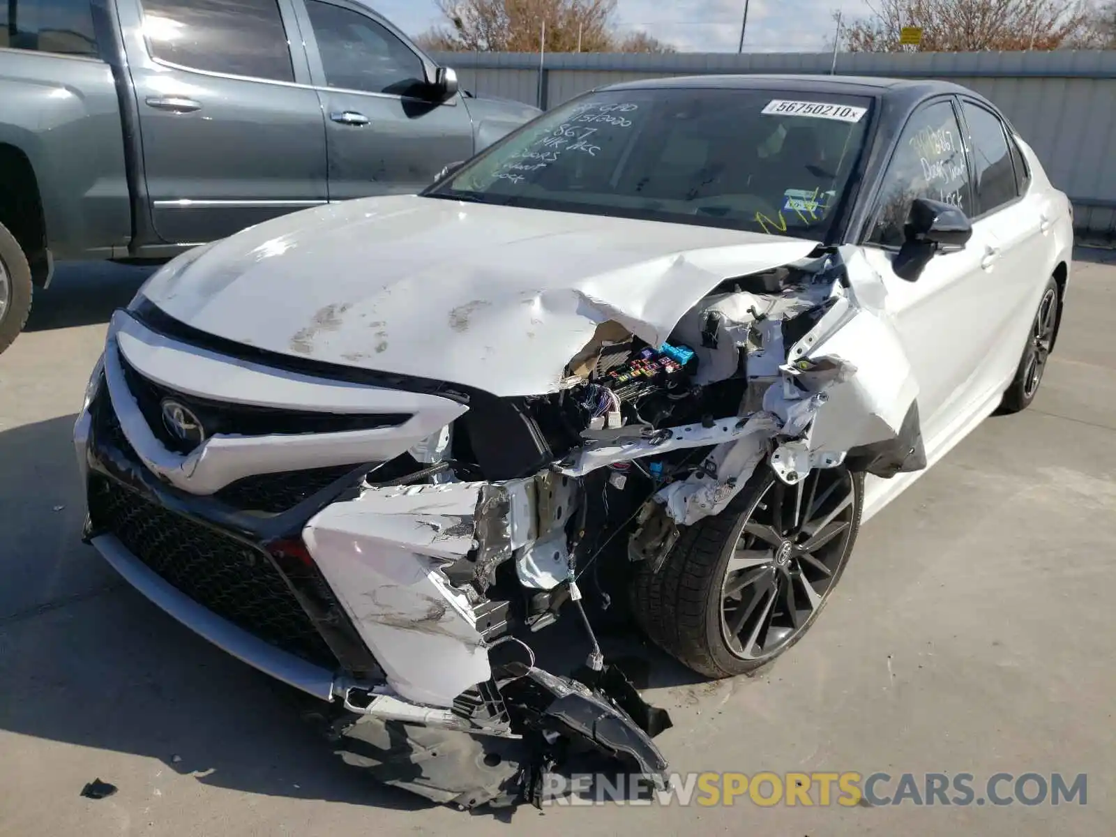 2 Photograph of a damaged car 4T1BZ1HK6KU032288 TOYOTA CAMRY 2019