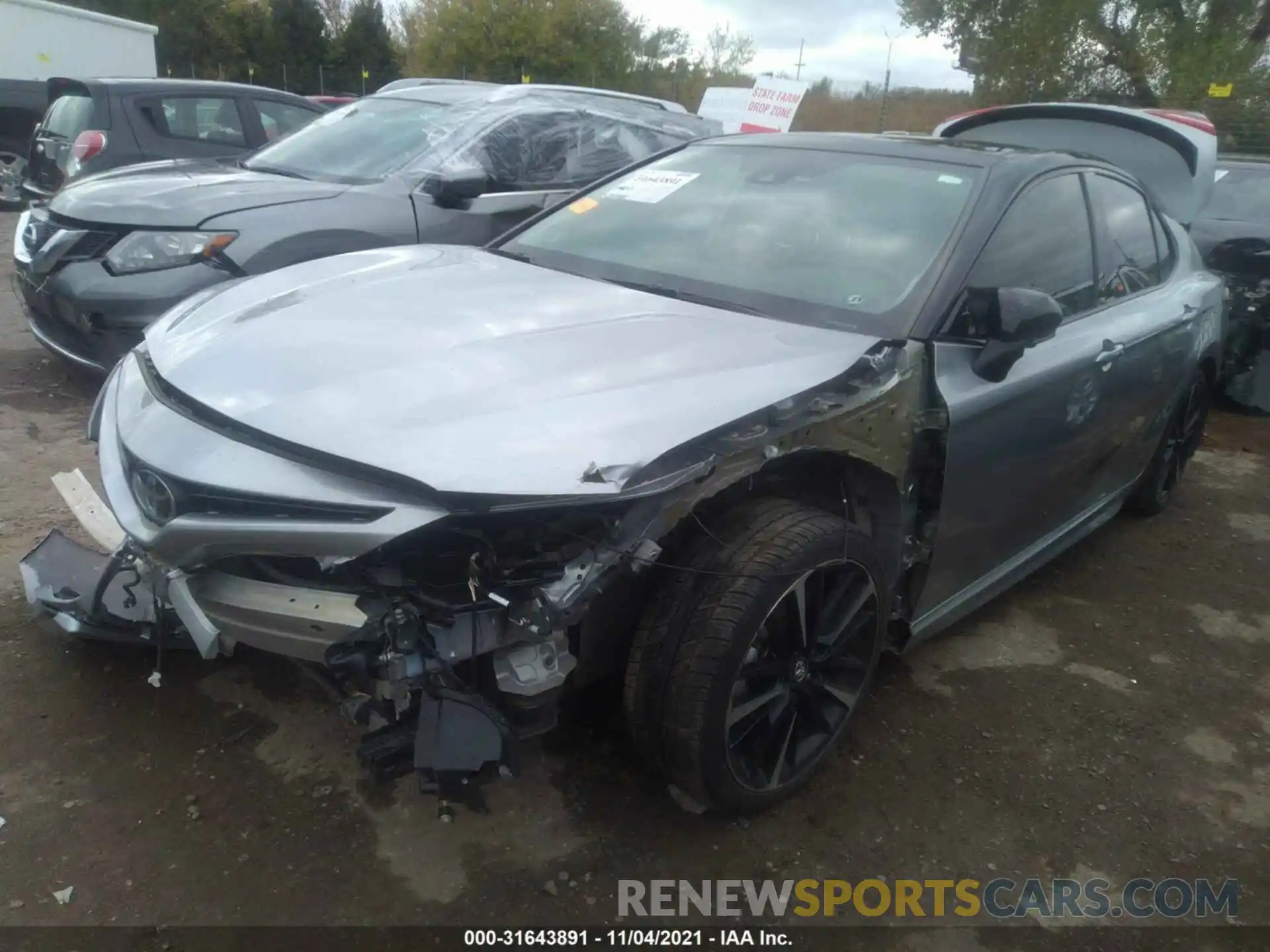 2 Photograph of a damaged car 4T1BZ1HK7KU024037 TOYOTA CAMRY 2019