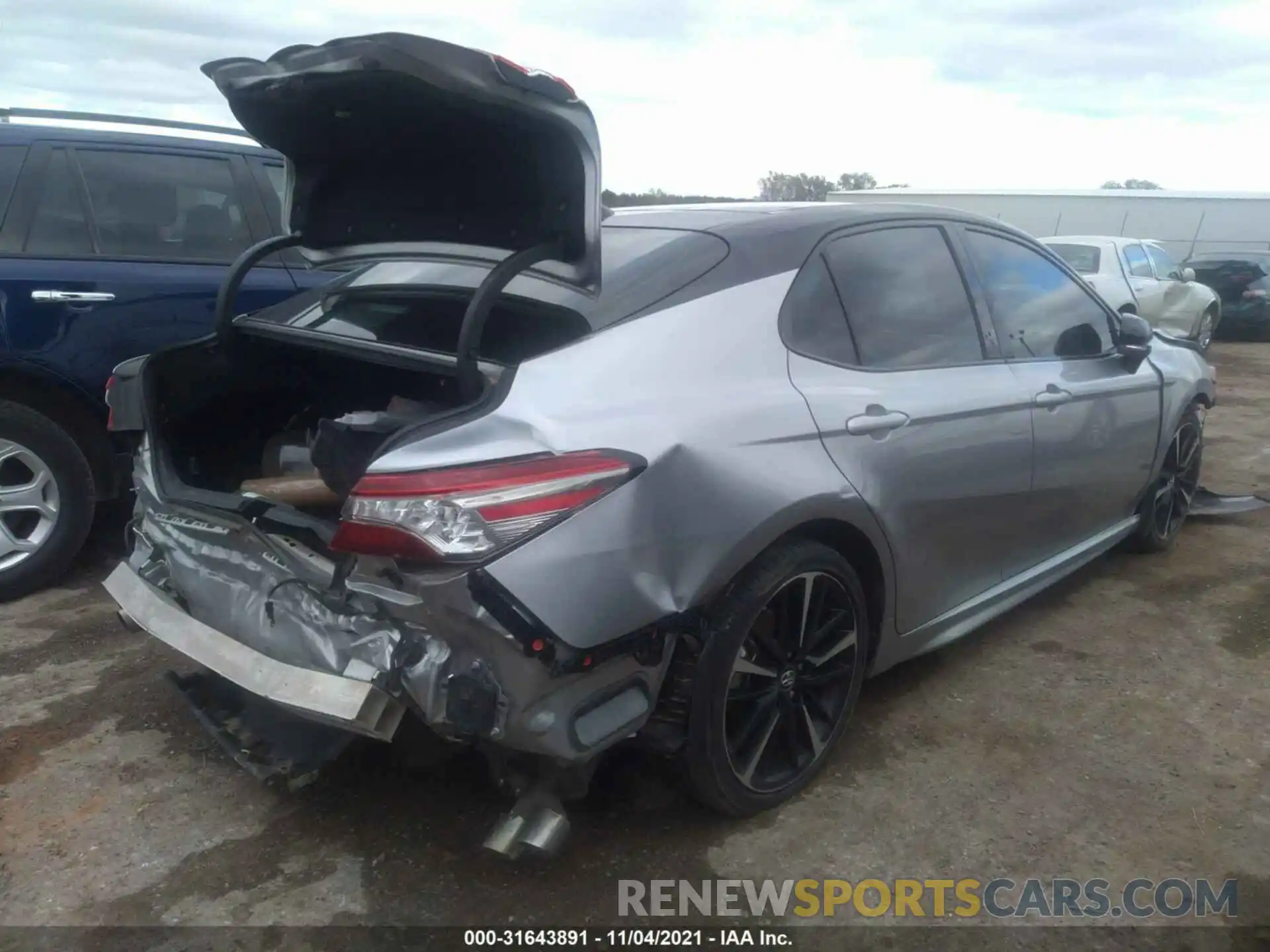 4 Photograph of a damaged car 4T1BZ1HK7KU024037 TOYOTA CAMRY 2019