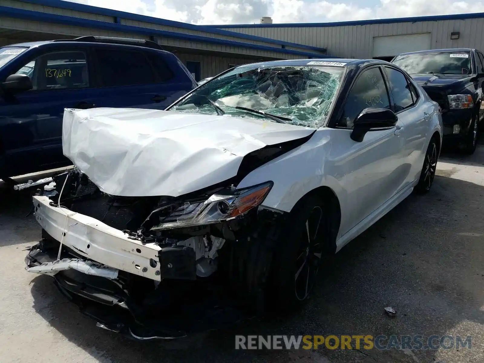 2 Photograph of a damaged car 4T1BZ1HK7KU028704 TOYOTA CAMRY 2019