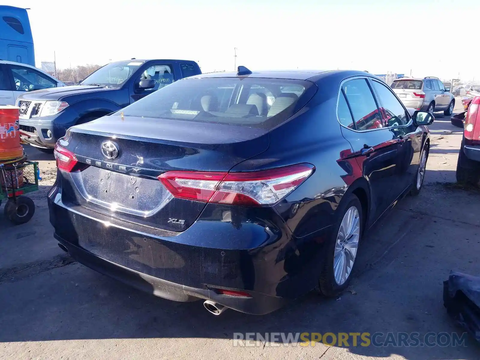 4 Photograph of a damaged car 4T1BZ1HK7KU509312 TOYOTA CAMRY 2019