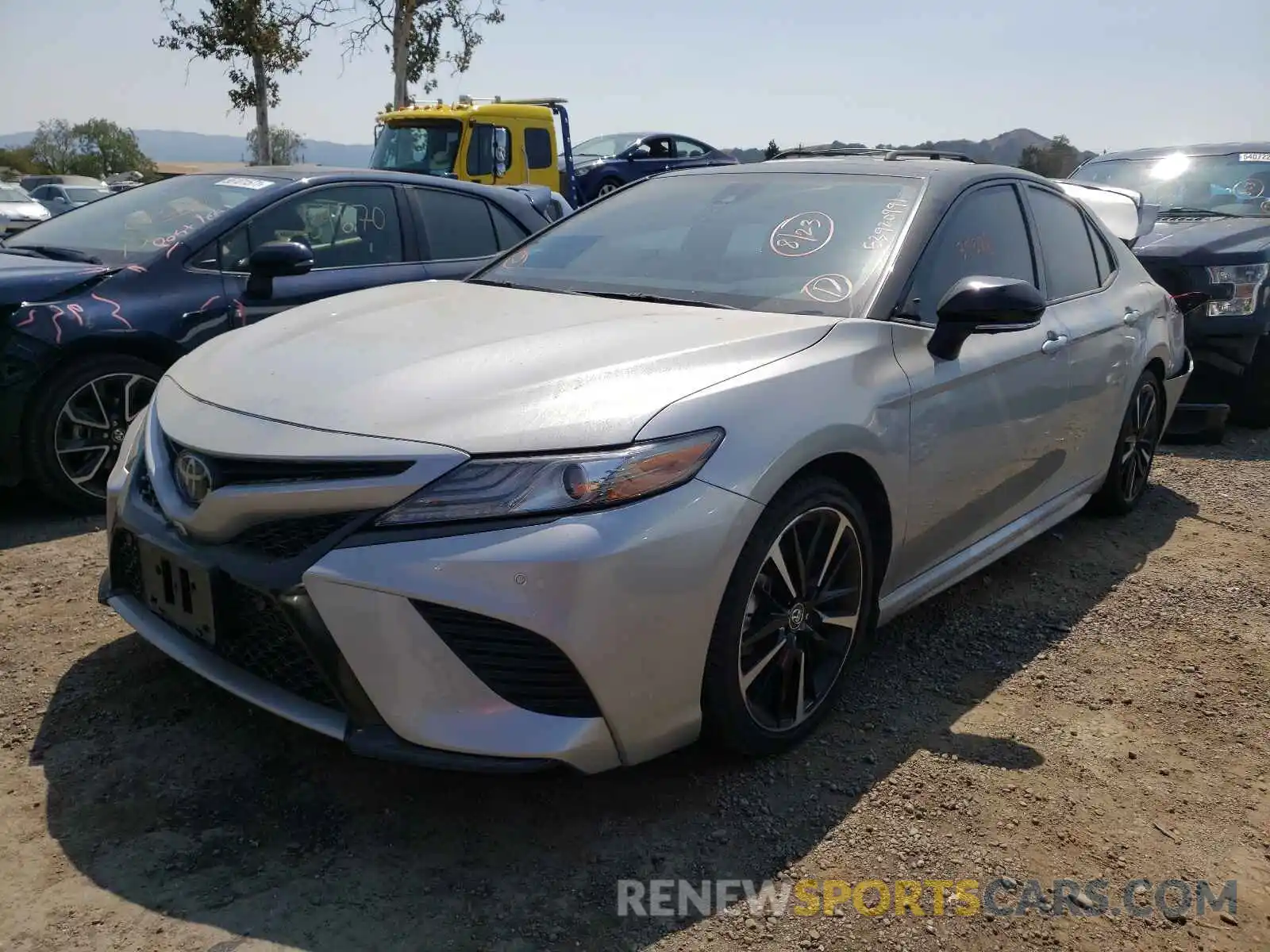 2 Photograph of a damaged car 4T1BZ1HK8KU025780 TOYOTA CAMRY 2019