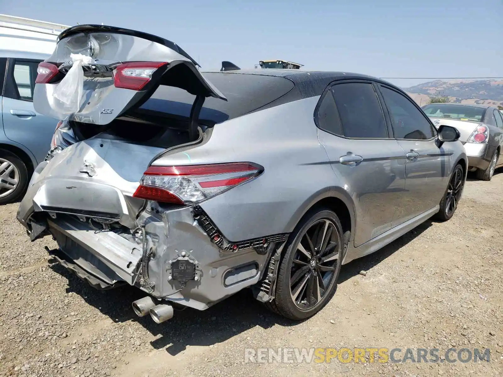 4 Photograph of a damaged car 4T1BZ1HK8KU025780 TOYOTA CAMRY 2019