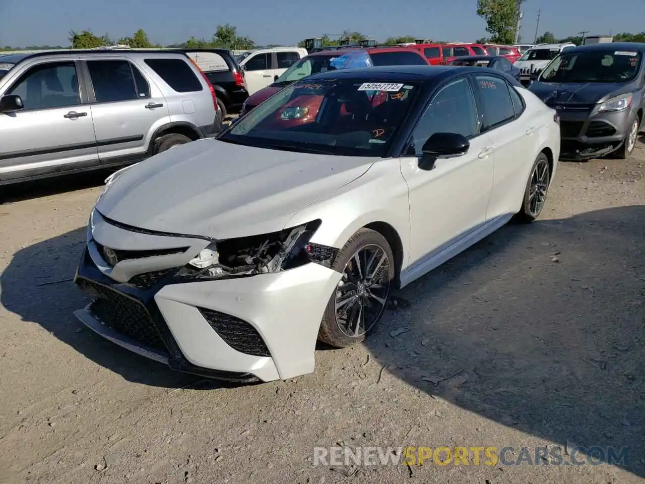 2 Photograph of a damaged car 4T1BZ1HK8KU026959 TOYOTA CAMRY 2019