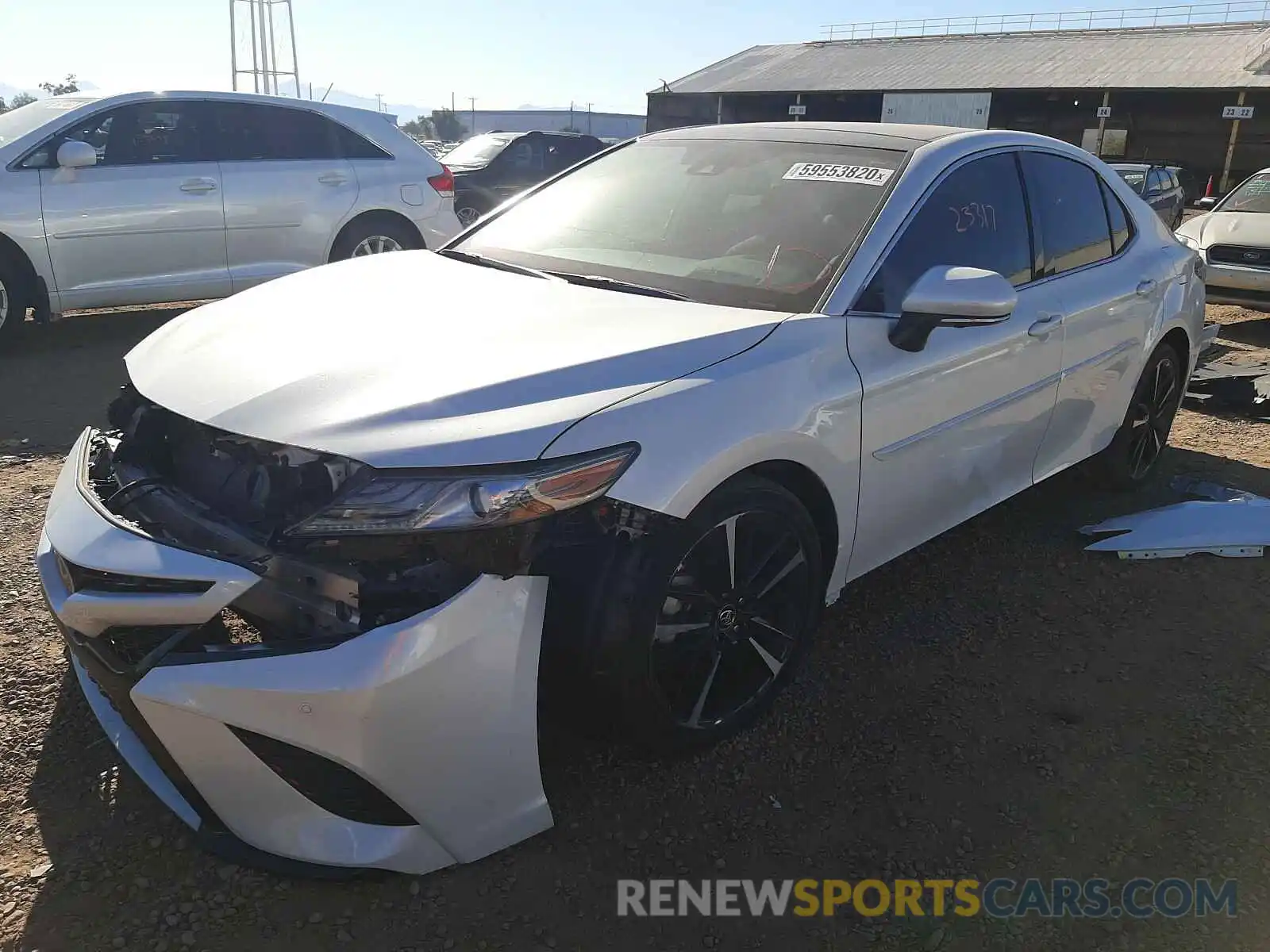 2 Photograph of a damaged car 4T1BZ1HK8KU028226 TOYOTA CAMRY 2019