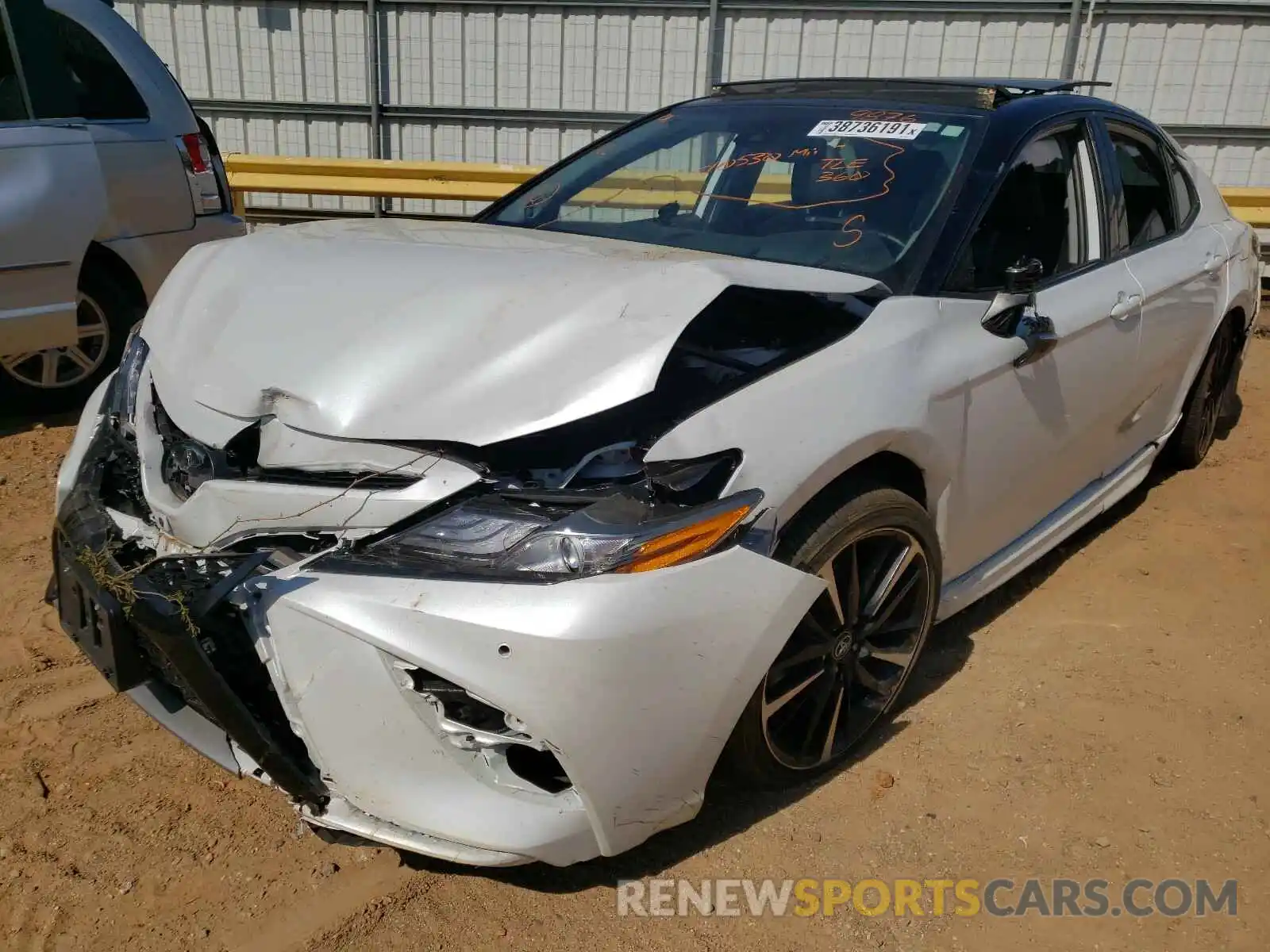 2 Photograph of a damaged car 4T1BZ1HK8KU029876 TOYOTA CAMRY 2019