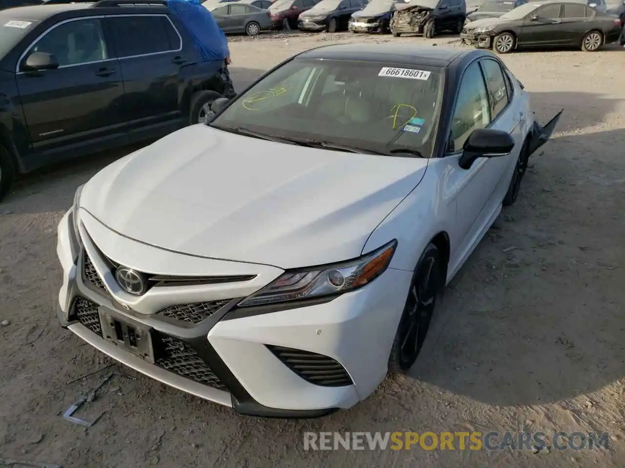 2 Photograph of a damaged car 4T1BZ1HK9KU024251 TOYOTA CAMRY 2019