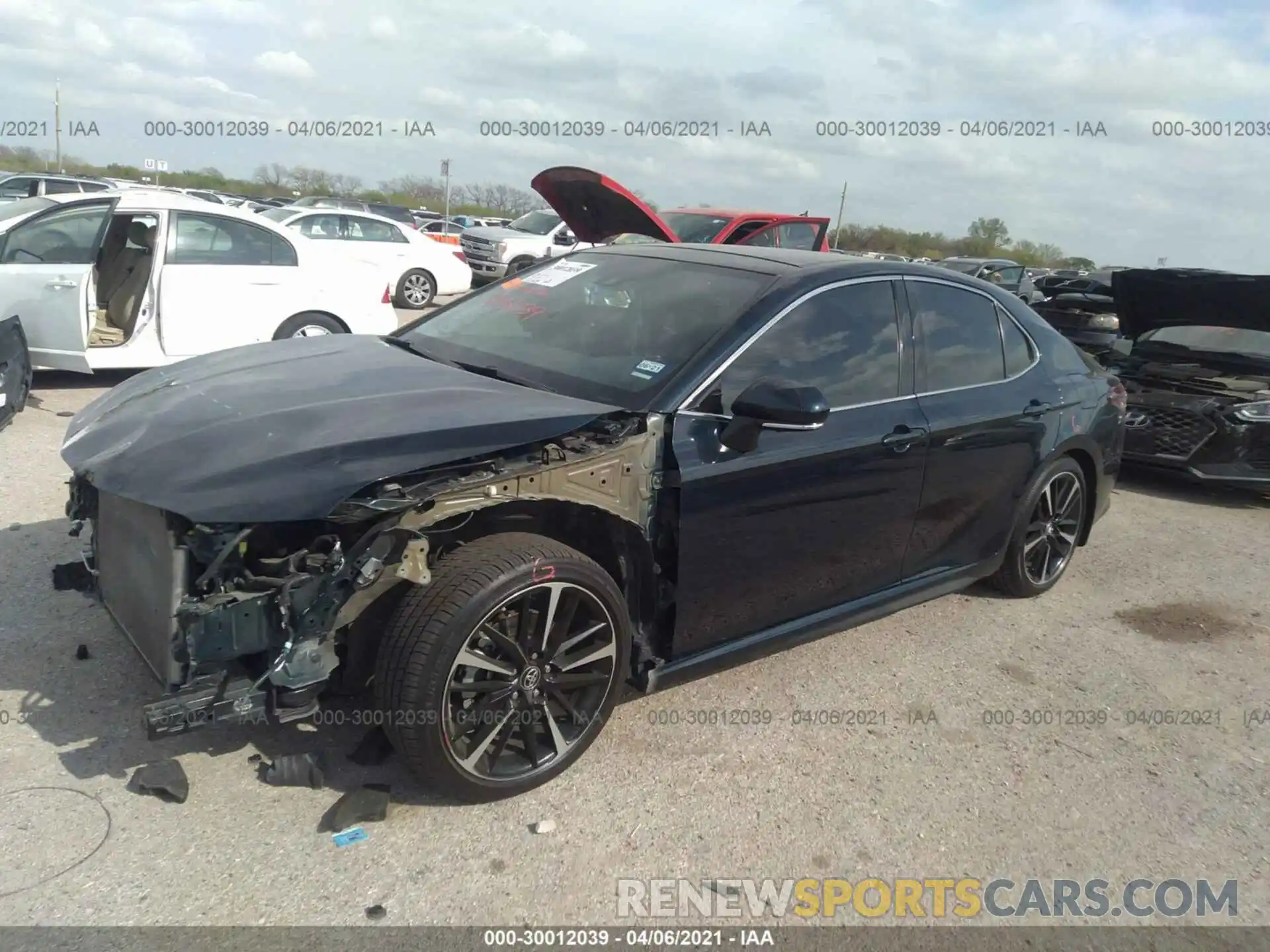 2 Photograph of a damaged car 4T1BZ1HK9KU027019 TOYOTA CAMRY 2019