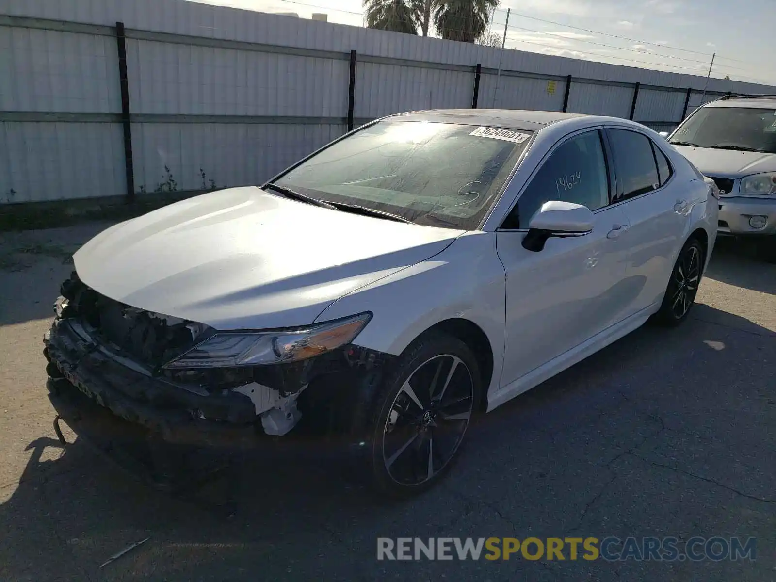 2 Photograph of a damaged car 4T1BZ1HK9KU031250 TOYOTA CAMRY 2019