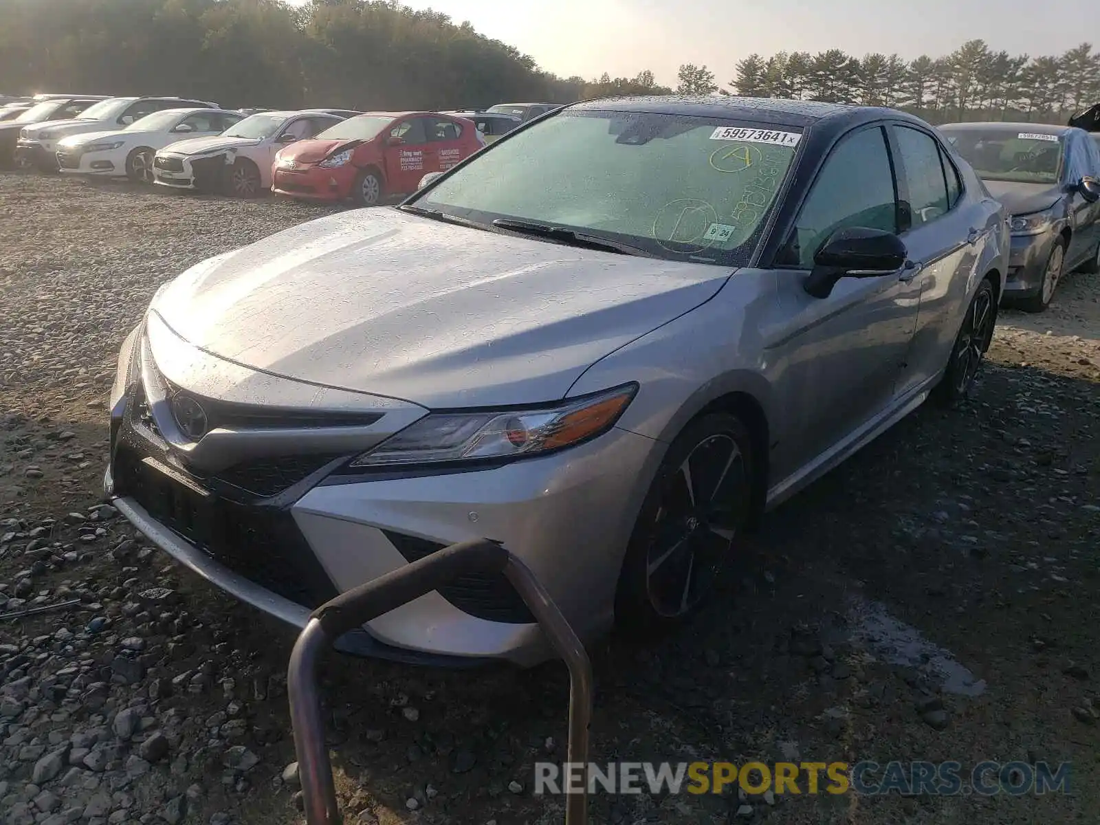 2 Photograph of a damaged car 4T1BZ1HK9KU031734 TOYOTA CAMRY 2019