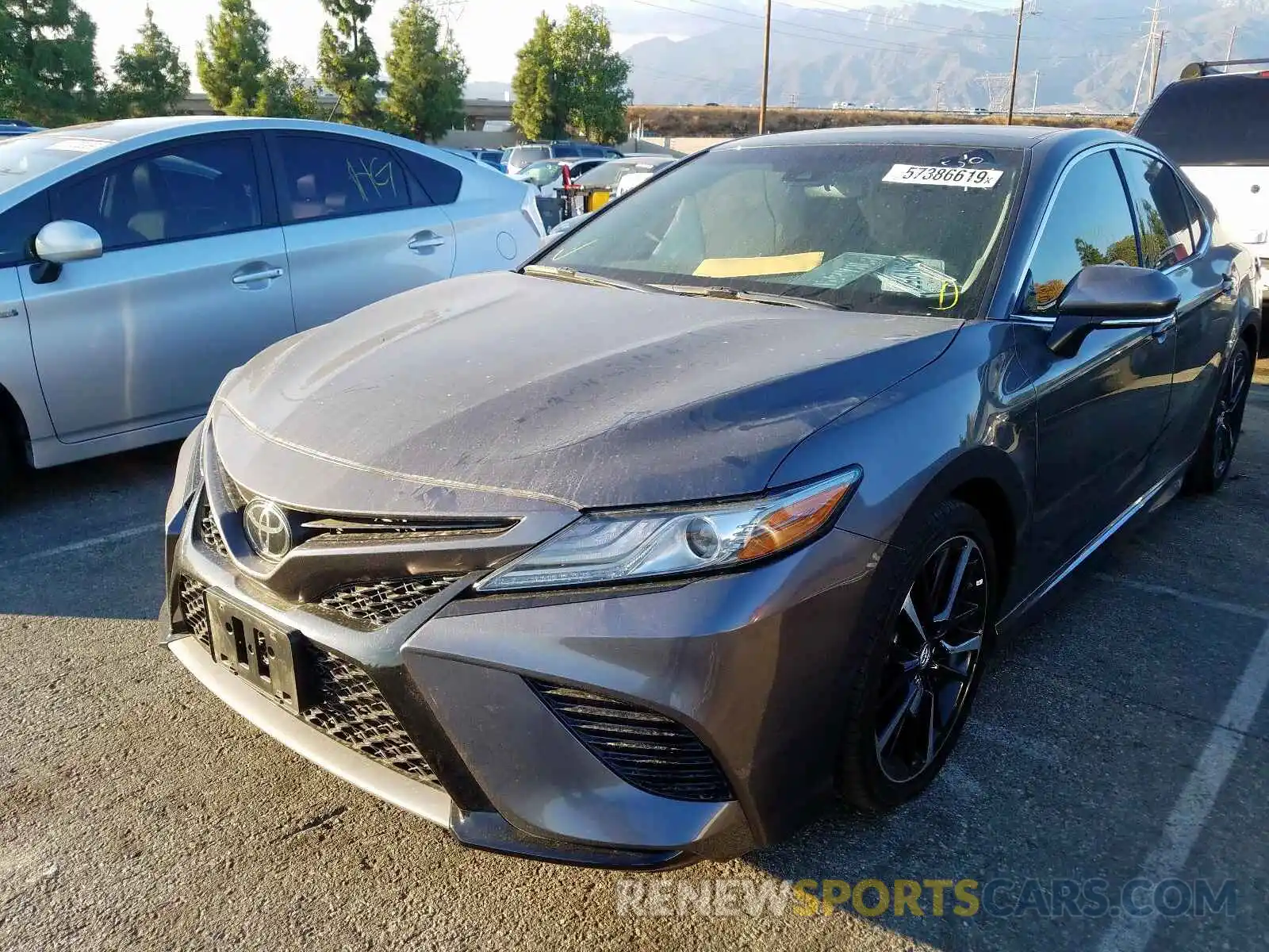 2 Photograph of a damaged car 4T1BZ1HK9KU509151 TOYOTA CAMRY 2019