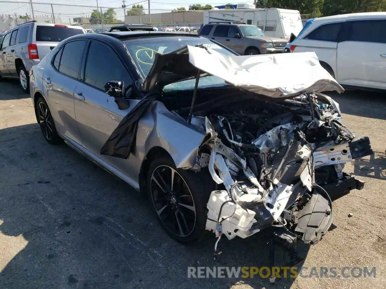 1 Photograph of a damaged car 4T1BZ1HKXKU023206 TOYOTA CAMRY 2019