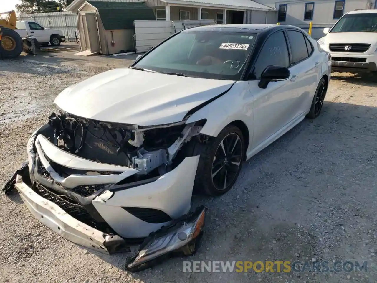 2 Photograph of a damaged car 4T1BZ1HKXKU023867 TOYOTA CAMRY 2019