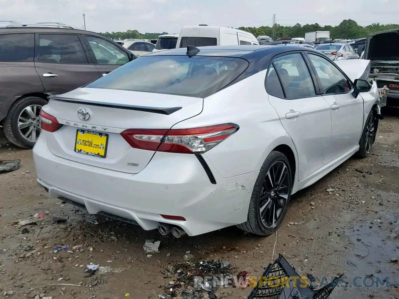 4 Photograph of a damaged car 4T1BZ1HKXKU023920 TOYOTA CAMRY 2019