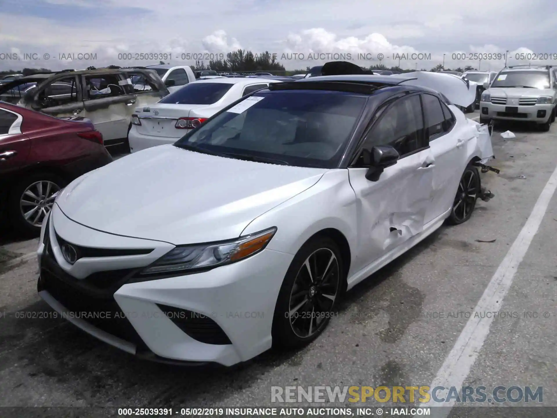 2 Photograph of a damaged car 4T1BZ1HKXKU024663 TOYOTA CAMRY 2019