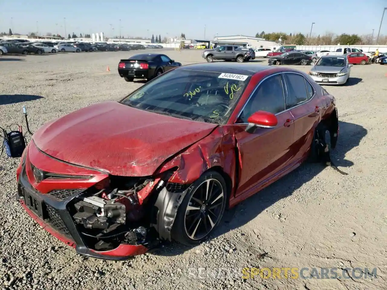 2 Photograph of a damaged car 4T1BZ1HKXKU026297 TOYOTA CAMRY 2019