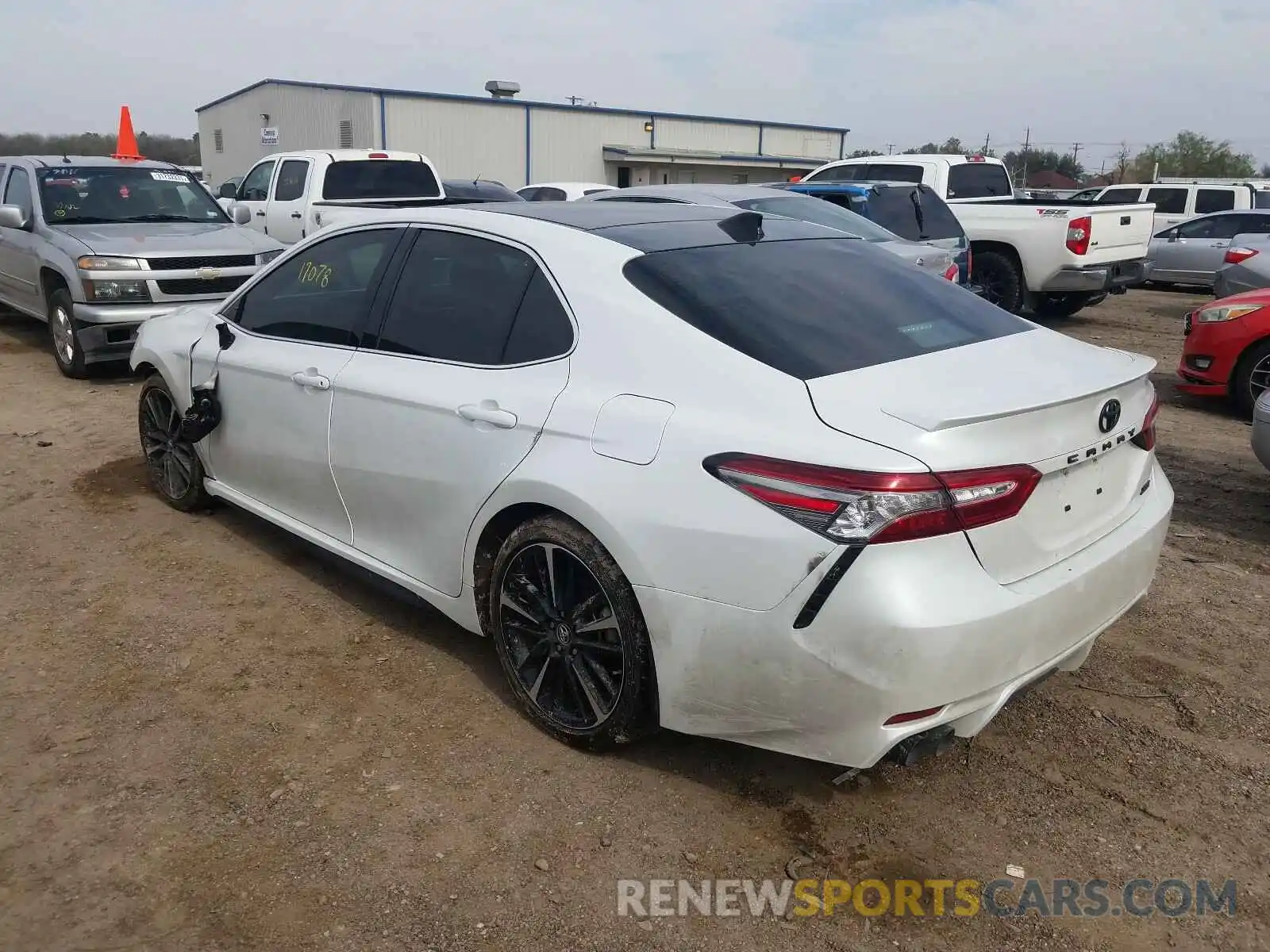 3 Photograph of a damaged car 4T1BZ1HKXKU030771 TOYOTA CAMRY 2019