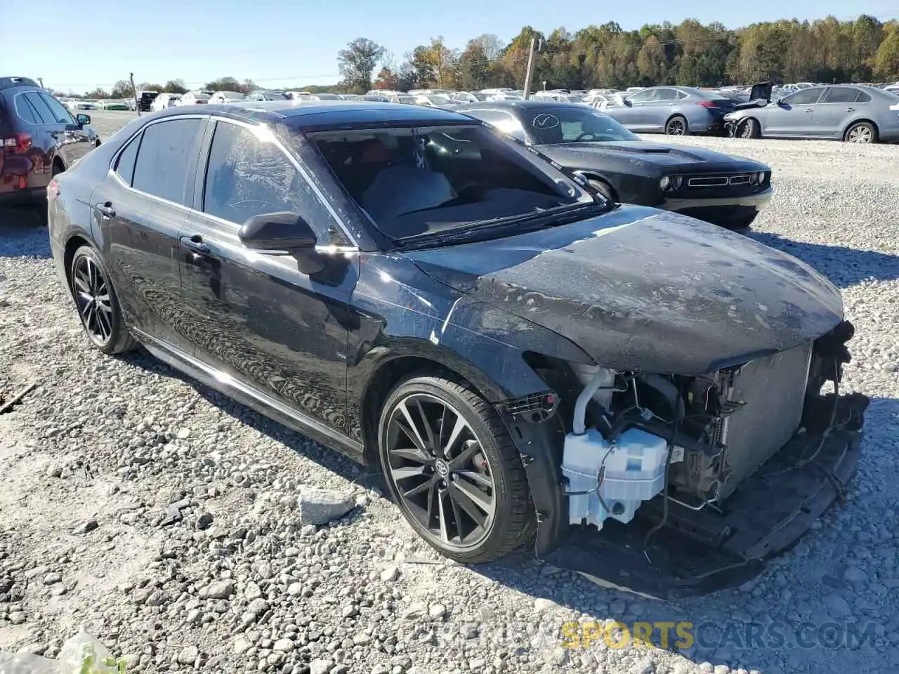 4 Photograph of a damaged car 4T1BZ1HKXKU031256 TOYOTA CAMRY 2019