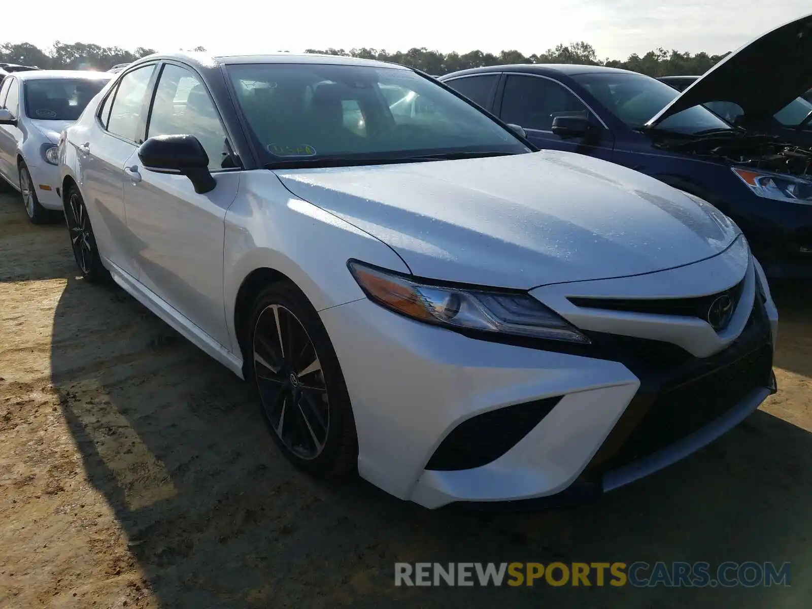 1 Photograph of a damaged car 4T1BZ1HKXKU032018 TOYOTA CAMRY 2019