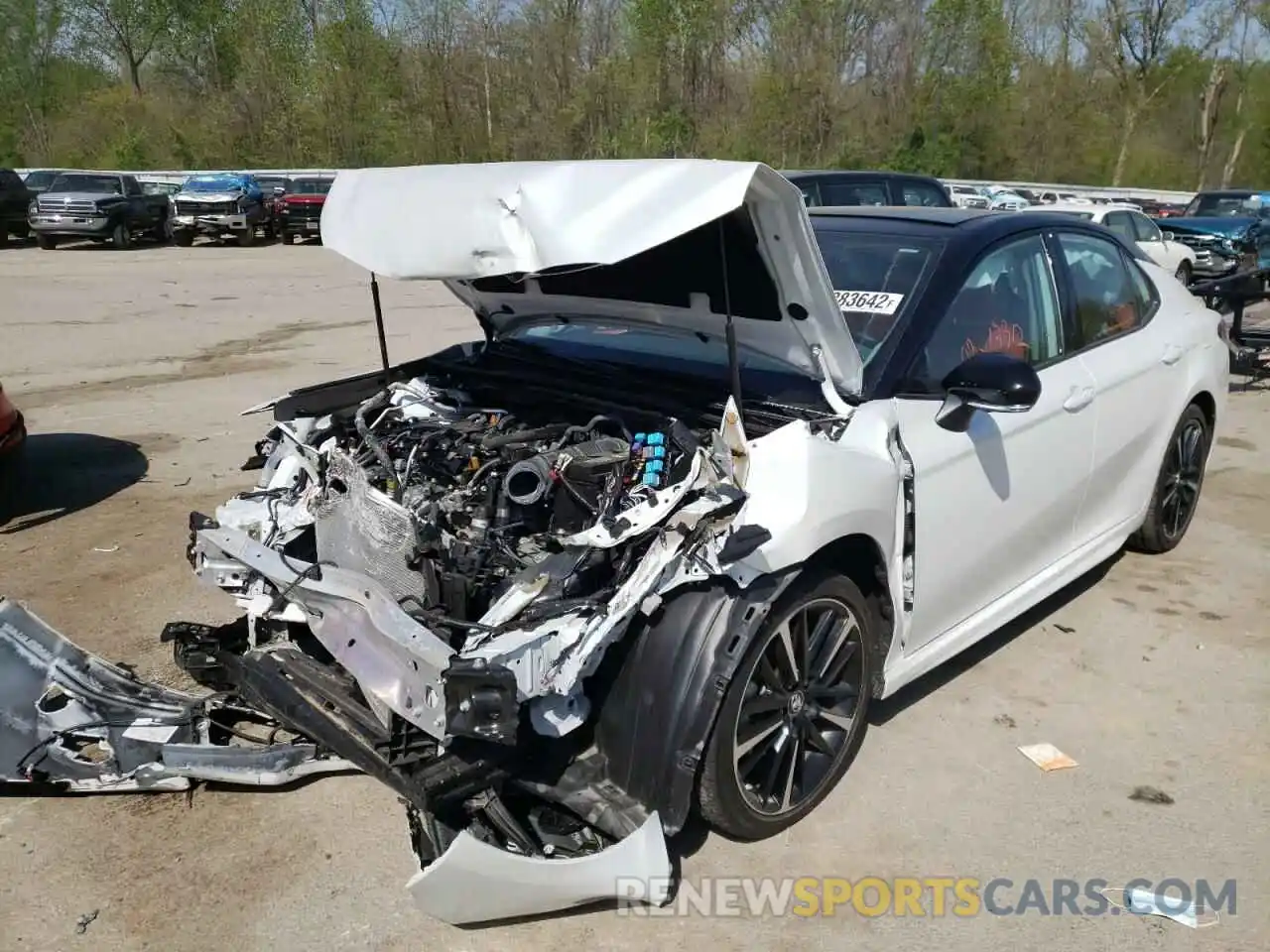 2 Photograph of a damaged car 4T1BZ1HKXKU032214 TOYOTA CAMRY 2019