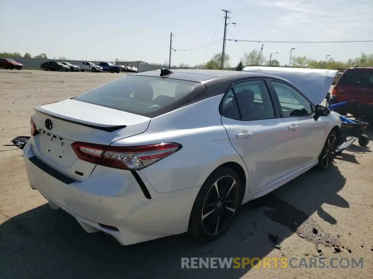 4 Photograph of a damaged car 4T1BZ1HKXKU032214 TOYOTA CAMRY 2019