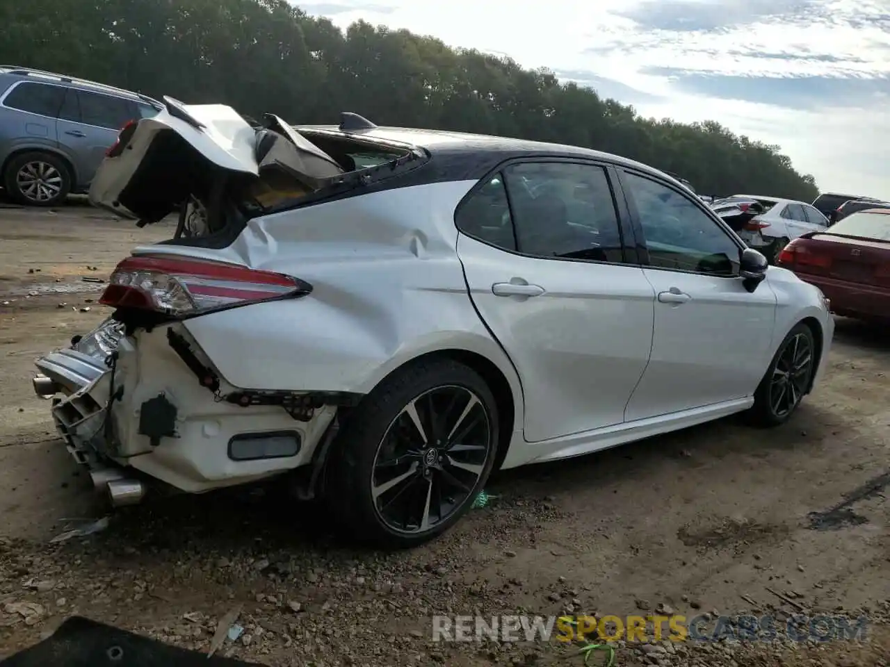 3 Photograph of a damaged car 4T1BZ1HKXKU032505 TOYOTA CAMRY 2019