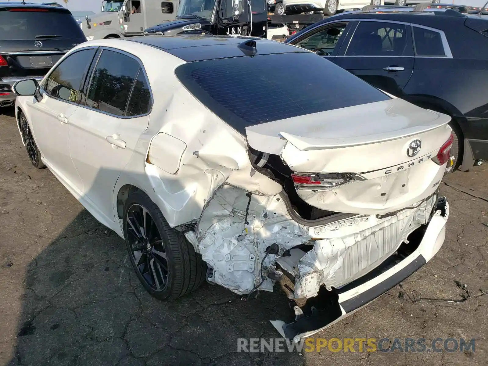 3 Photograph of a damaged car 4T1BZ1HKXKU032603 TOYOTA CAMRY 2019