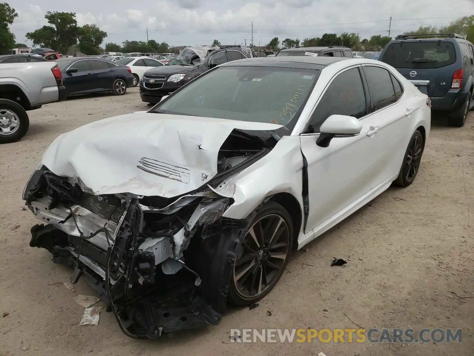 2 Photograph of a damaged car 4T1BZ1HKXKU508946 TOYOTA CAMRY 2019