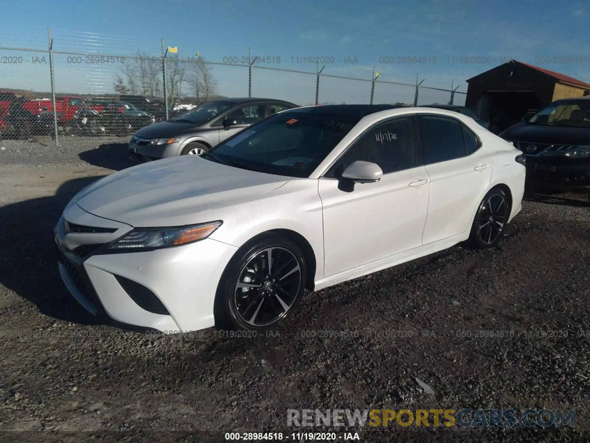 2 Photograph of a damaged car 4T1BZ1HKXKU509174 TOYOTA CAMRY 2019